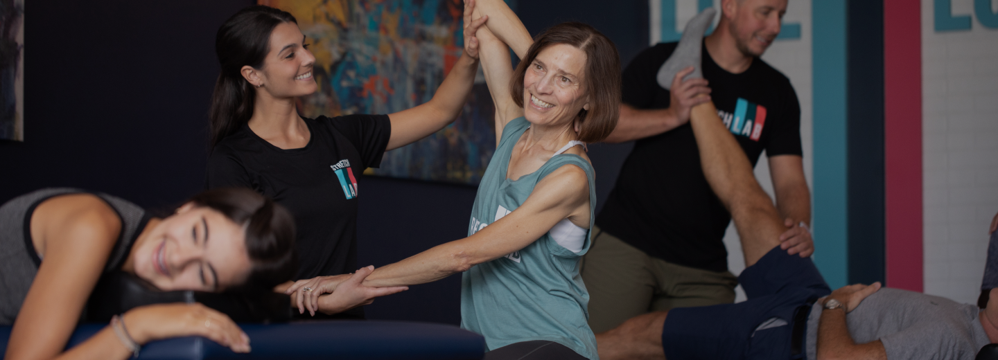 Group stretching at StretchLab